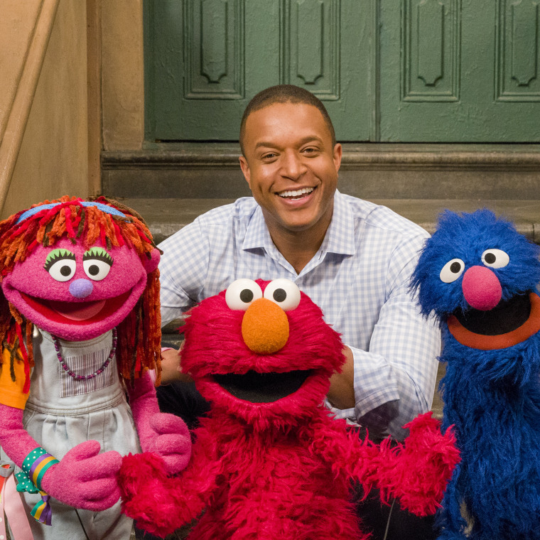 Craig Melvin went to Sesame Street to meet with Lily (at left), a Muppet experiencing homelessness, and her friends Elmo and Grover to talk about a serious issue that millions of children face. 