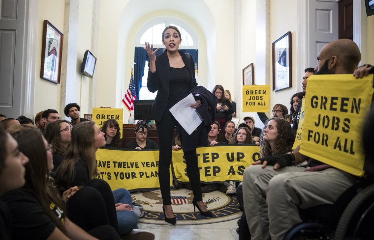 Alexandria Ocasio-Cortez, congresswoman-elect from New York, speaks to activists with the Sunrise Movement protesting in the offices of House Minority Leader Nancy Pelosi (D-Calif.) on Capitol Hill.