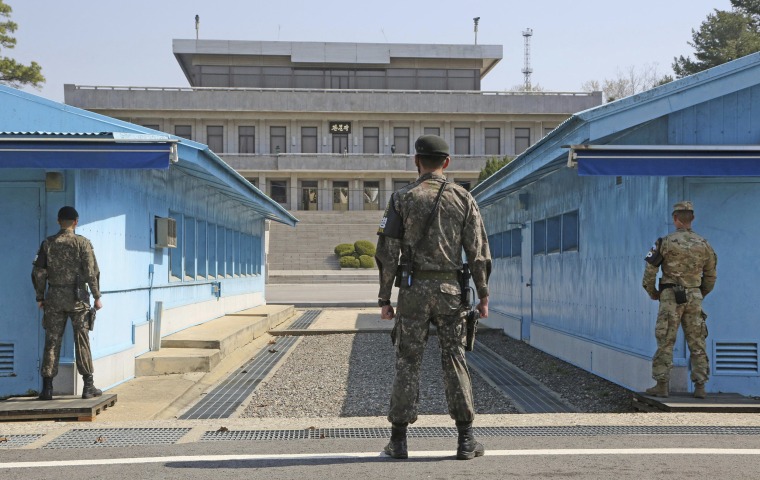 Image: South Korean and U.S. soldiers stand guard at Panmunjom in Paju City, South Korea