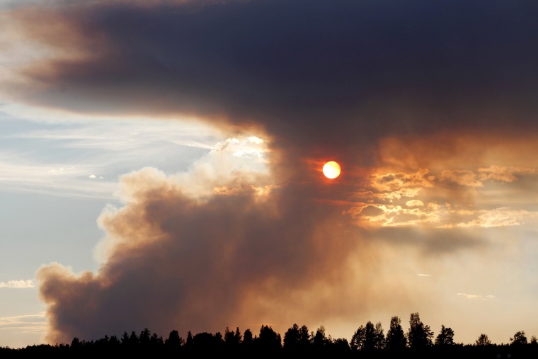 Image: A wildfire burns in Karbole, Sweden