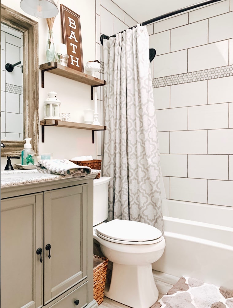 See this bathroom makeover with shiplap, subway tile and natural wood