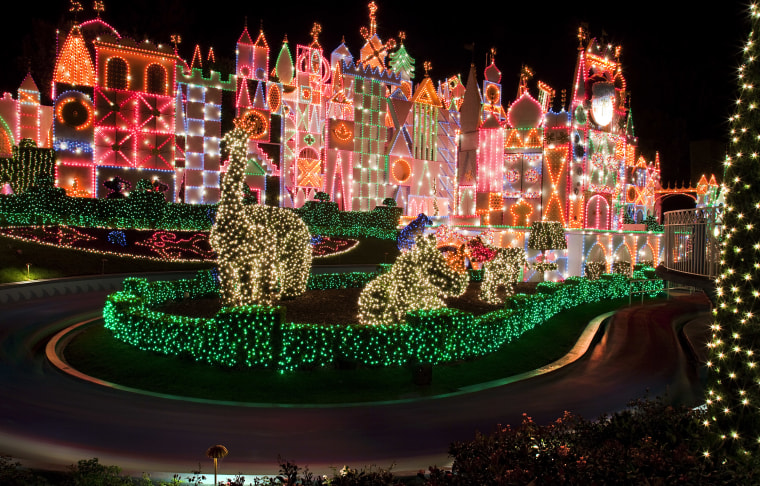 Disneyland's It's A Small World attraction, lit brightly for the holidays.