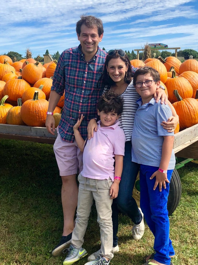 "The Fifth Trimester" author Lauren Smith Brody, pictured with husband Ben, relies on after-school care activities her sons Will, 10, and Teddy, 7, love to allow her to work without feeling guilty about it.