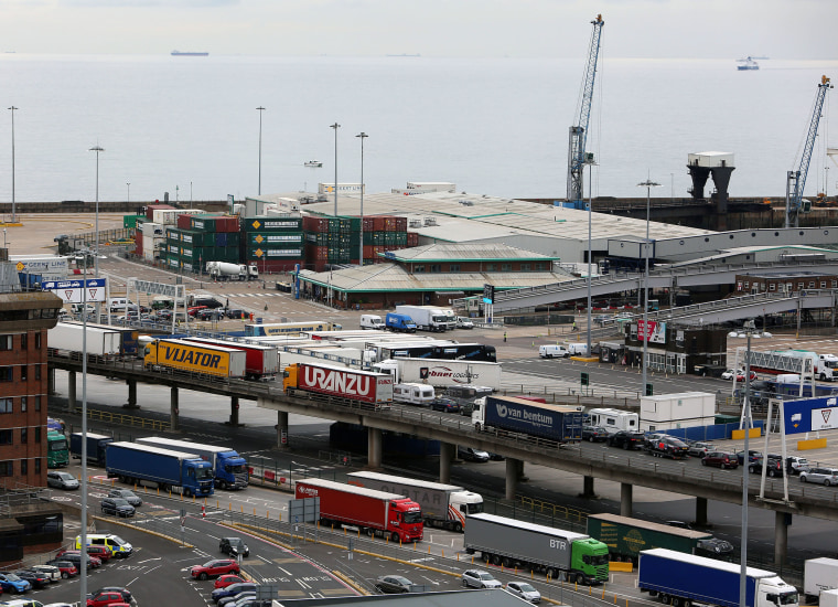 Image: Trucks board ferries in Dover, England