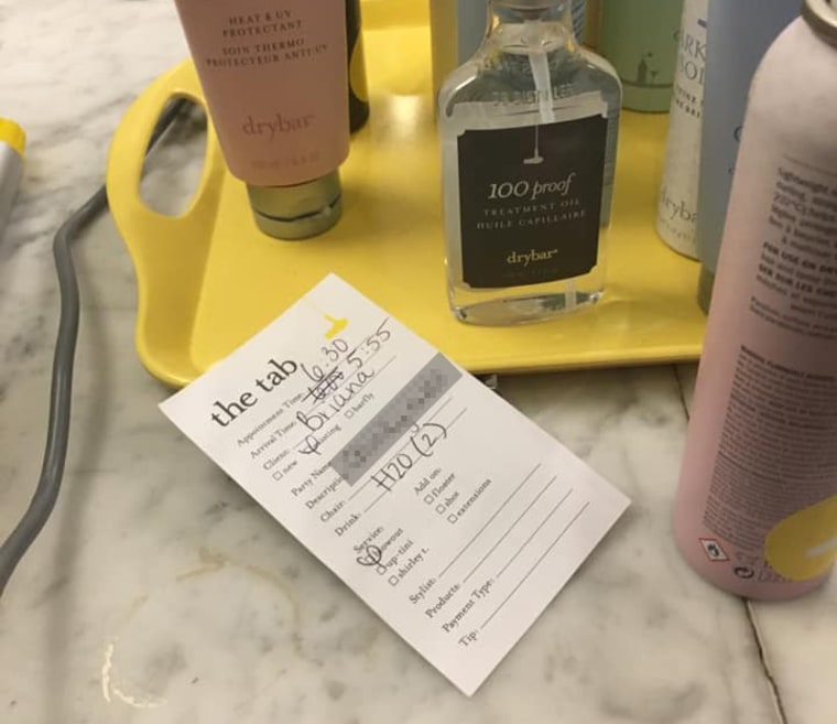 Briana Tae found an offensive term written on her receipt at a New York hair salon a line labeled "Description of Client." The description has been blurred here by NBC News.
