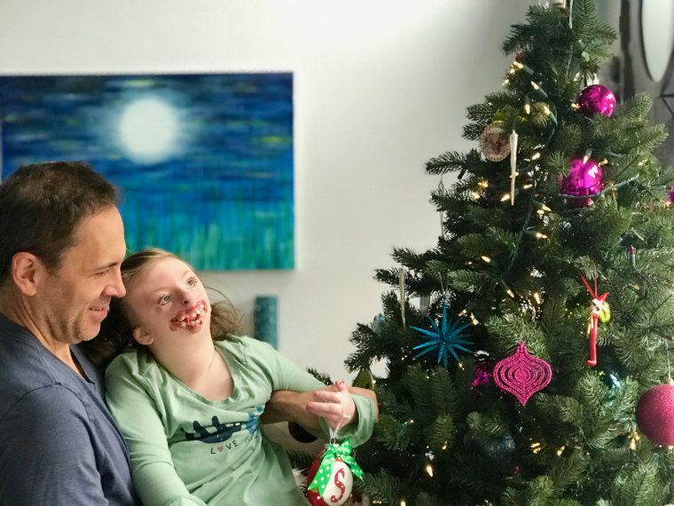 When Natalie Weaver posted a picture of her daughter looking at the Christmas tree, a woman told her to put Sophia out of her misery. This made Weaver realize there was still more work to be done.