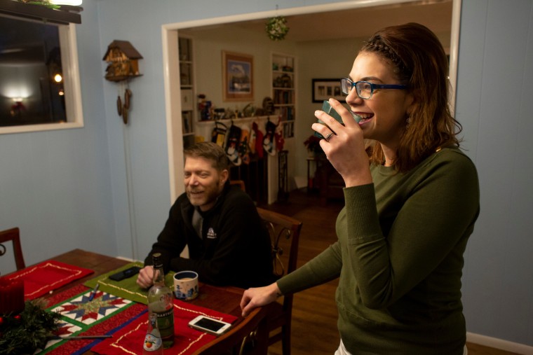 Vince Villano, left, and Nicole McNeil hang out at McNeil's home. Villano befriended his Starbucks barista, Nicole McNeil, and her husband, Justin, who has decided to donate his kidney to Villano, who has kidney disease. (Photo by David Ryder)