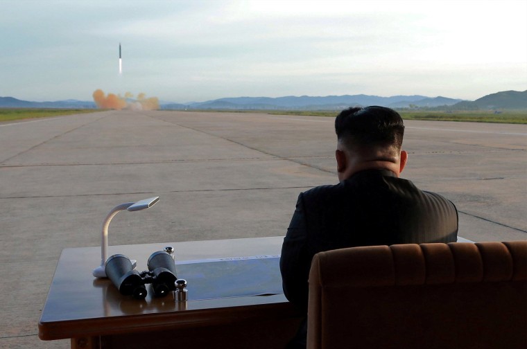 Image: North Korean leader Kim Jong Un watches the launch of a Hwasong-12 missile