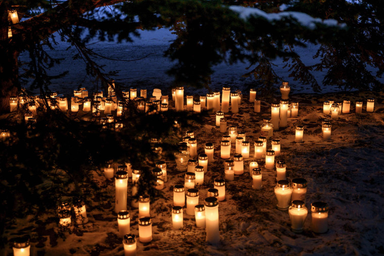 Image: Candles on graves at a cemetery in Vaasa, Finland, on Dec. 24.