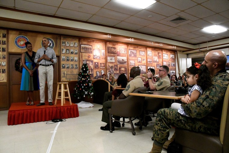 Image: President Barack Obama and Michelle Obama speak to U.S. Marines and personnel on Christmas day at Marine Corps Base Hawaii in 2016.