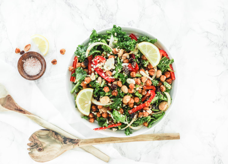 Add warming spices to your salad like in this recipe for Moroccan Chickpea Kale Salad made with curry powder, ginger, allspice and cayenne pepper.