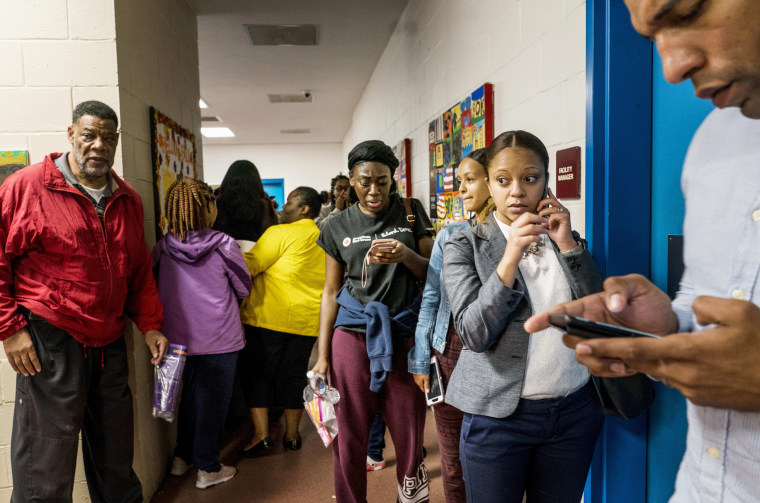 Image: Voters wait to cast ballots at the Pittman Park Recreation Center in Atlanta, Georgia, on Nov. 6, 2018.