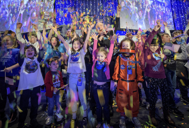 Image: New Horizons principal investigator Alan Stern, center, celebrates with school children when the New Horizons spacecraft approached Ultima Thule on Jan. 1, 2019.