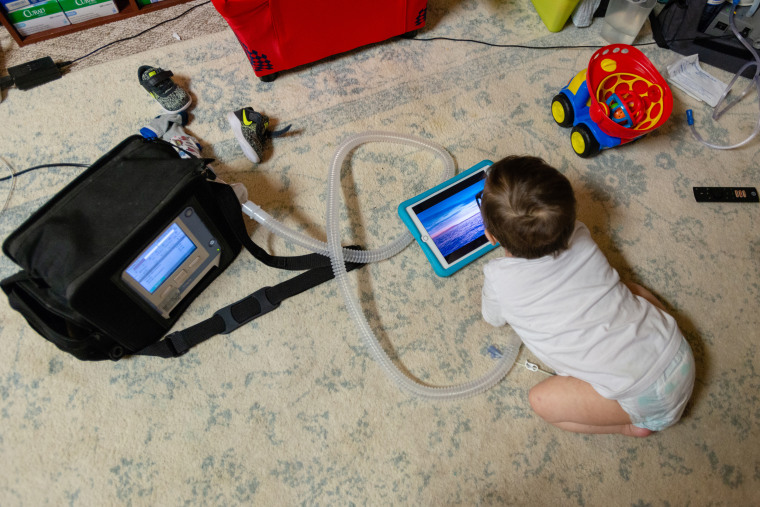 Anderson Moreno uses a portable ventilator because of his impaired lung capacity.