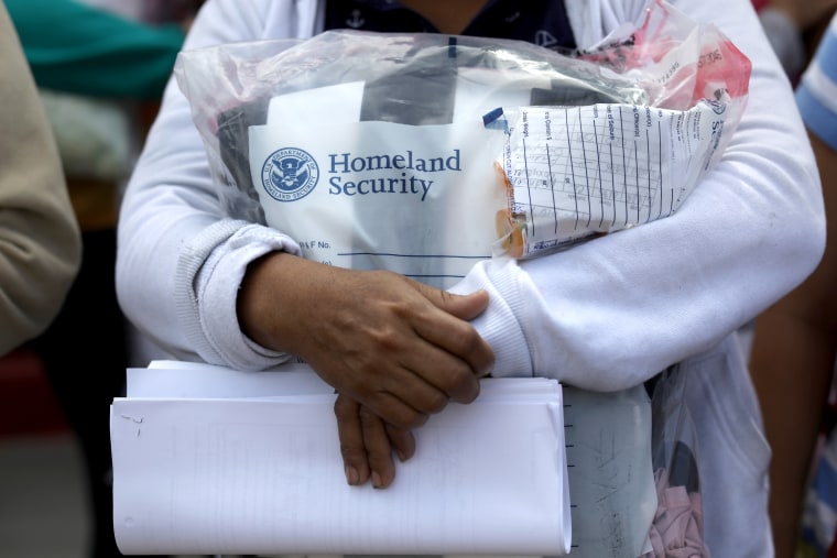 Image: Central American immigrants depart ICE custody pending future immigration court hearings in McAllen, Texas, on June 11, 2018.