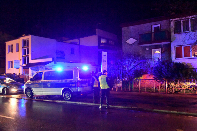 Image: FPolice secure the scene of a fire in an "escape room" that killed five teenage girls in Koszalin, Poland, on Jan. 4, 2019.