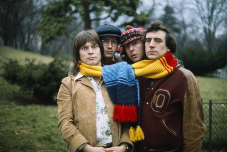 Monty Python Comedians Sharing a Scarf