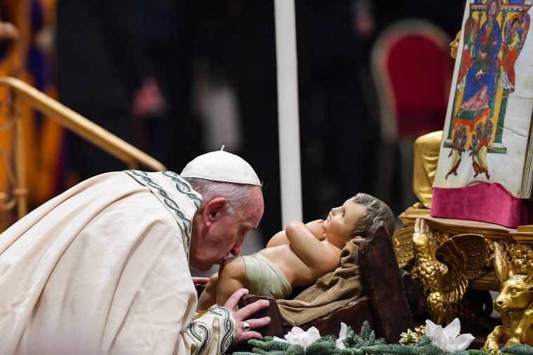 Pope Francis kisses the baby Jesus Christ during the \"Te Deum\" prayer for the year 2019 in Saint Peter's Basilica on Dec. 31, 2019.