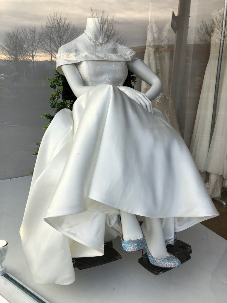wheelchair-using mannequin in wedding dress