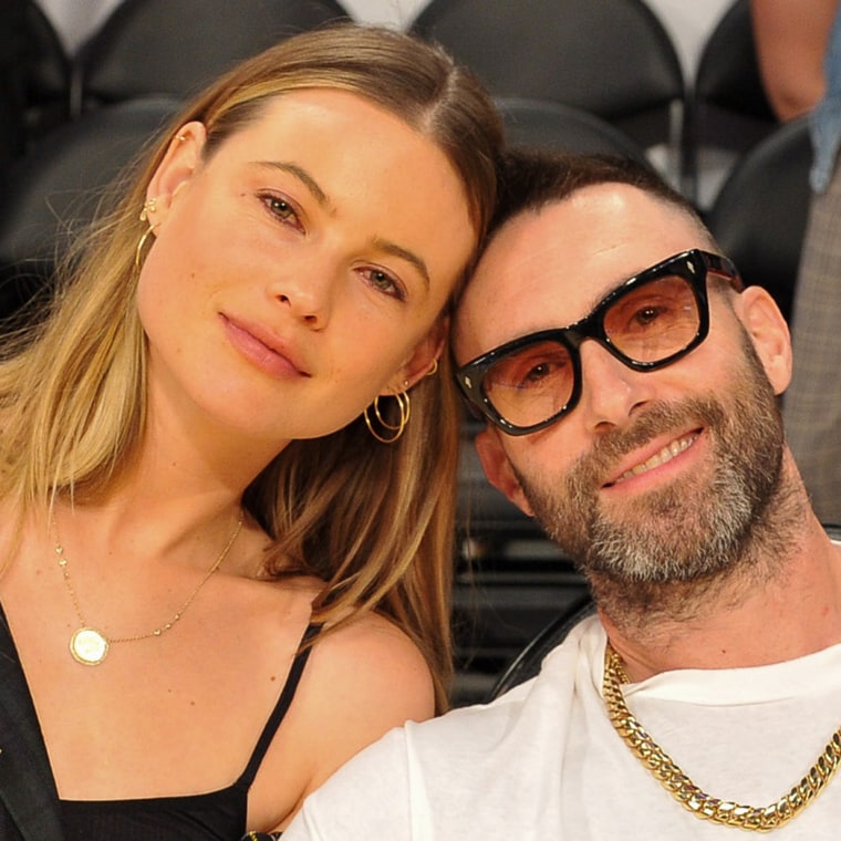 Behati Prinsloo with husband Adam Levine at Los Angeles Lakers game