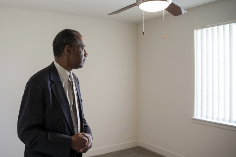 Image: Housing and Urban Development Secretary Ben Carson stands in an empty apartment in a HUD funded complex in Aurora, Colorado, on July 30, 2018.