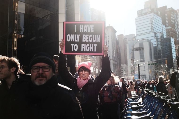 Image: A protester holds a sign at the Women's March in New York on Jan. 20, 2018.
