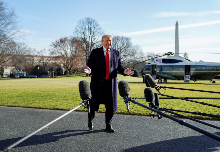 Image: U.S. President Donald Trump speaks to the media as he returns from Camp David to the White House in Washington
