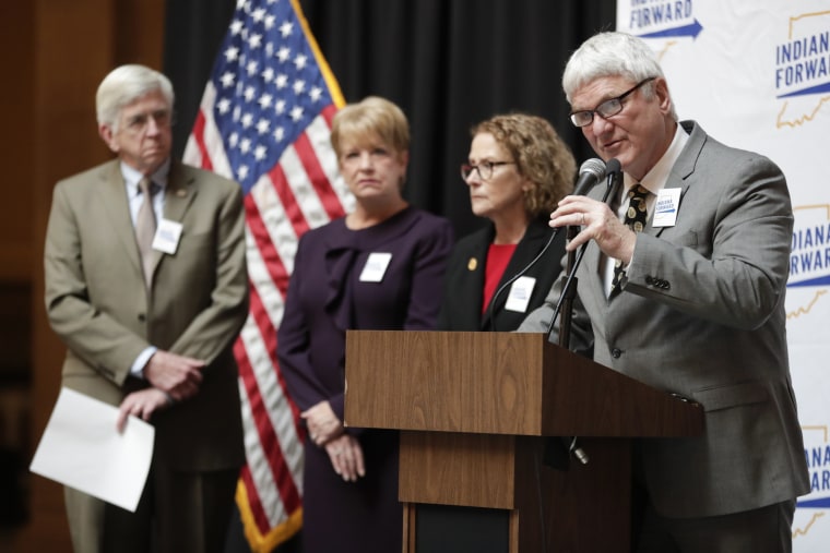 Image: State Rep. Tony Cook is joined by state Reps. Ed DeLaney, left, Cindy Ziemke, and Donna Schaibley as they at discuss hate crimes legislation at the Statehouse in Indianapolis on Jan. 8, 2019.