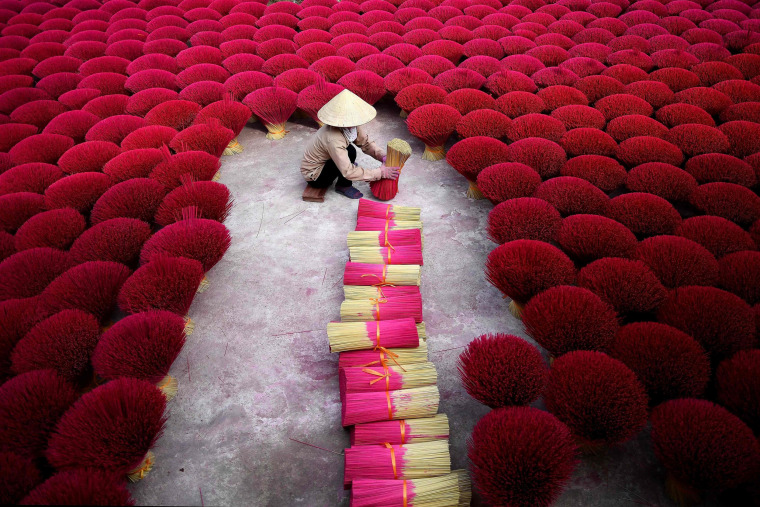 Image: TOPSHOT-VIETNAM-LIFESTYLE-HOLIDAY-RELIGION-CRAFT