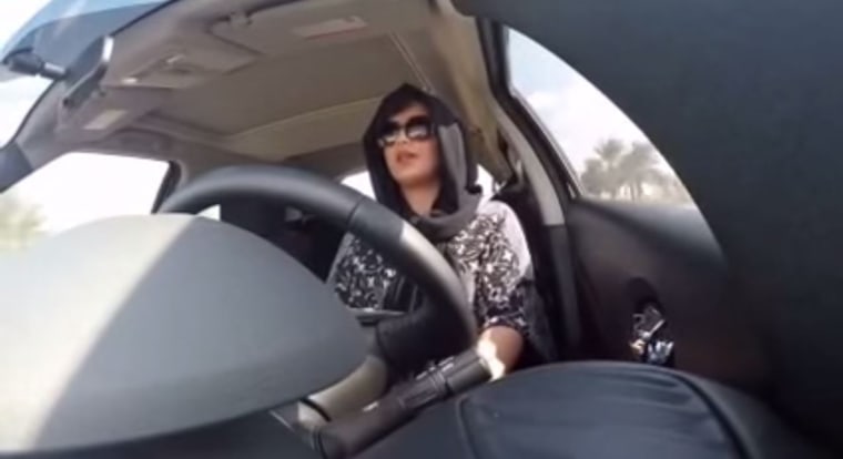 Image: Saudi female activist Loujain al-Hathloul defies the driving ban in 2014.