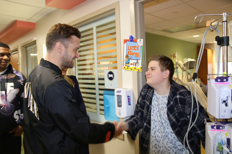 Justin Timberlake meets a young patient at Methodist Children’s Hospital in San Antonio, Texas.