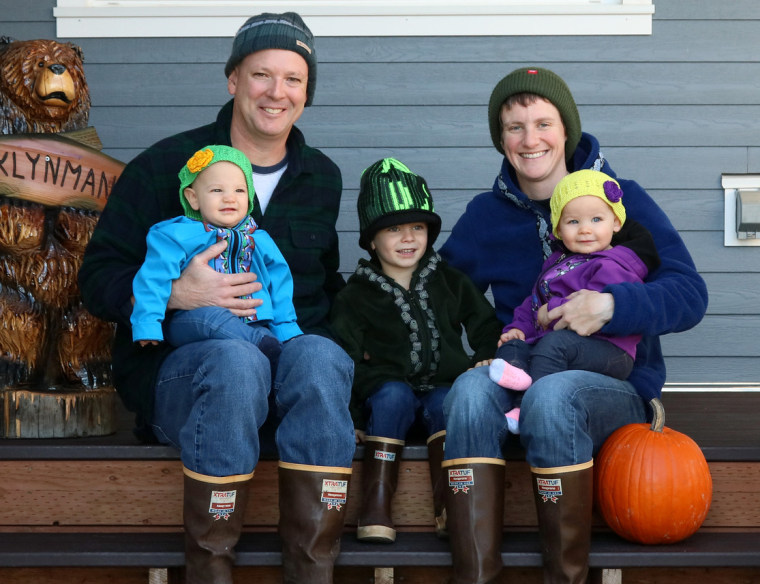 Image: Greg and Lizzy Klynman with their three children.