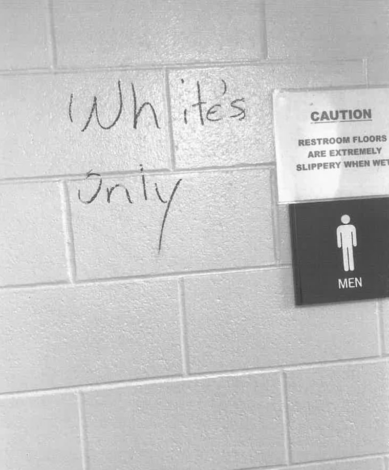 Image: Graffiti scrawled in a bathroom at a GM plant in Toledo, Ohio.