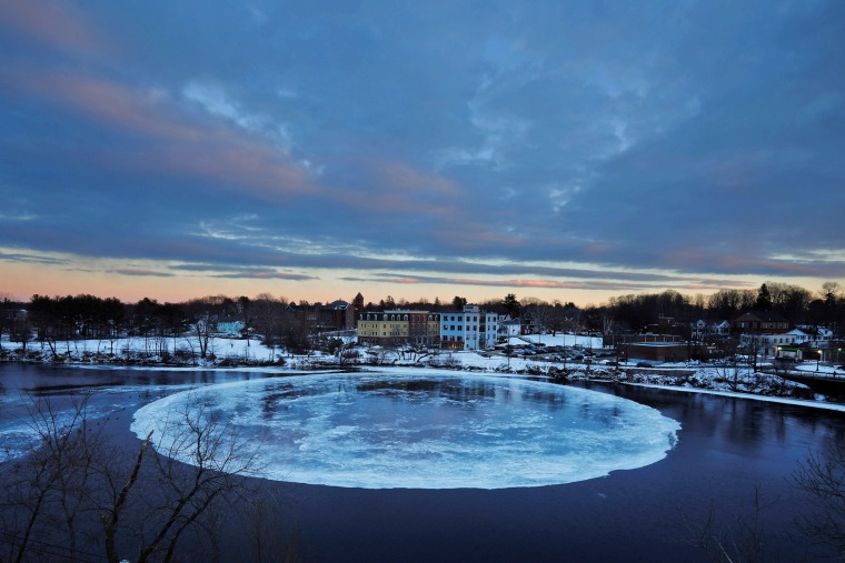 Image: A large, circular ice floe sits in the Presumpscot River in Westbrook