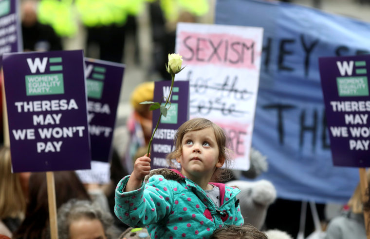 Image: Protesters take part in the Women's March calling for equality, justice and an end to austerity in London