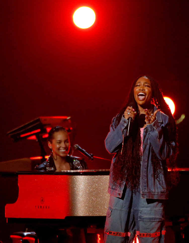 Image: Singers SZA and Keys perform a medley during the taping of "Aretha! A Grammy Celebration For The Queen Of Soul" at the Shrine Auditorium in Los Angeles