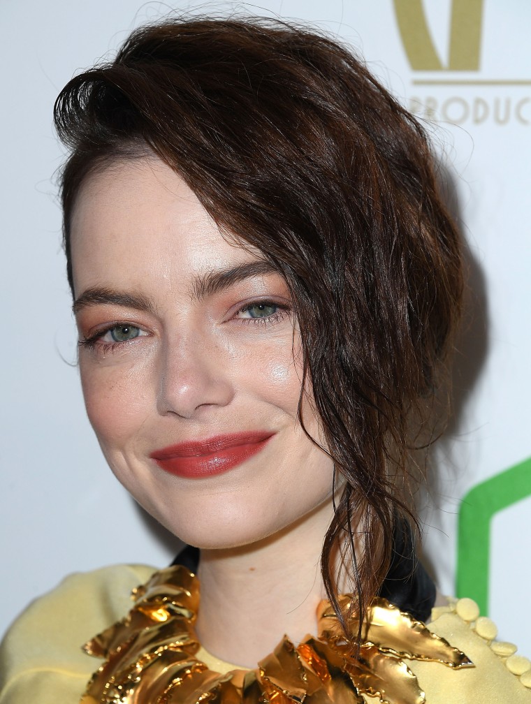 Emma Stone ditches red hair for brunette shade