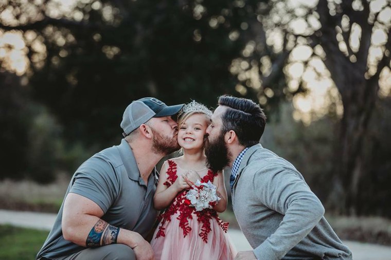 Dylan Lenox (left) and David Mengon (right) have formed a friendship of mutual respect centered around their 5-year-old daughter, Willow (center). 