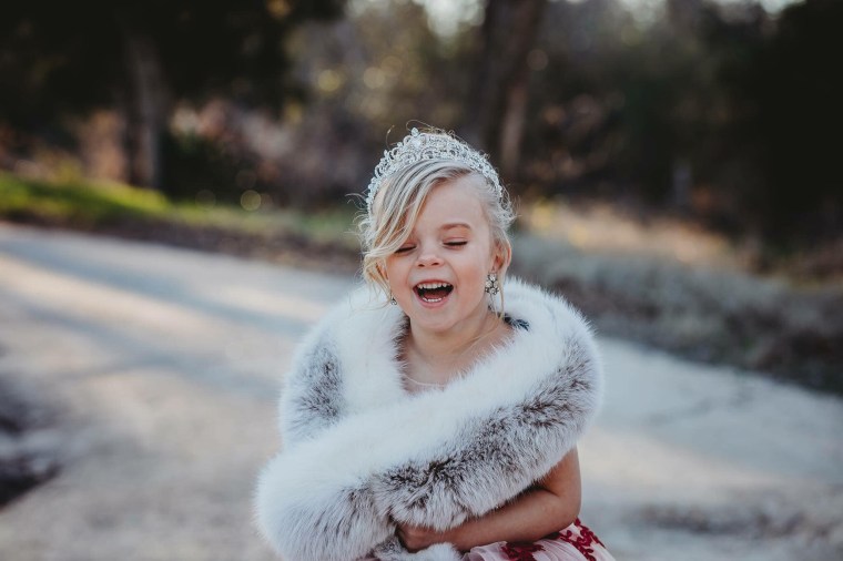 Five-year-old Willow got all dressed up before being escorted by her dad, David Mengon, to her school dance.