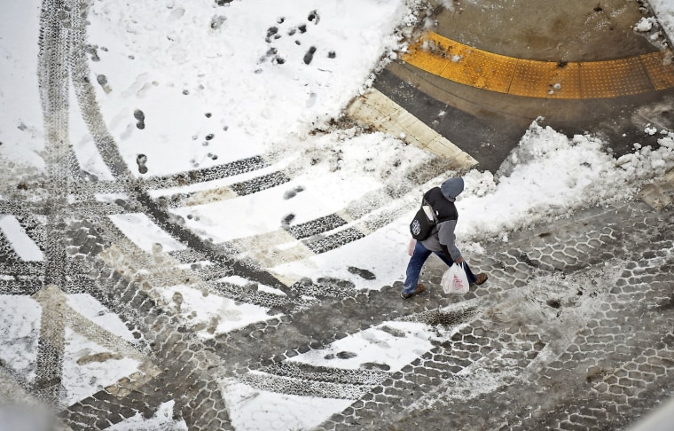 Image: A pedestrian in downtown Scranton, Pa.