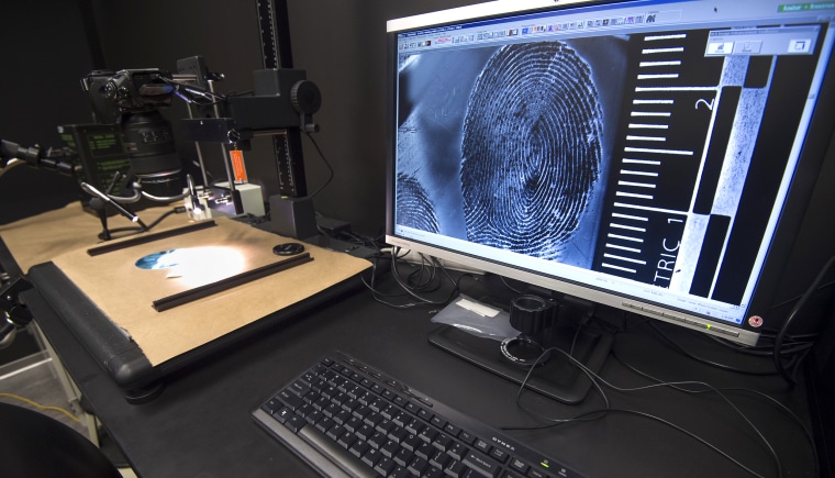 A fingerprint is enlarged for examination in the Latent Print Lab at the U.S. Homeland Security Investigation Forensic Laboratory in Tyson Corner, Virginia, in 2016.