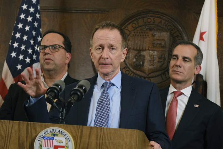 Image: Superintendent Austin Beutner, center, speaks during a news conference as Los Angeles Mayor Eric Garcetti, right, and Union President Alex Caputo-Pearl listen after a tentative deal was reached between school officials and the teachers union after