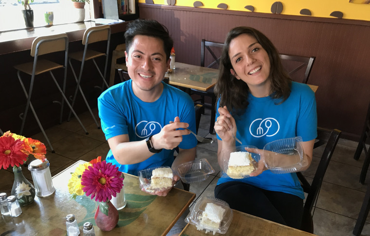 Food for All co-founders Victor Carreno and Sabine Valenga with a "rescued" dessert from Petsi Pies, in Somerville, Massachusetts.