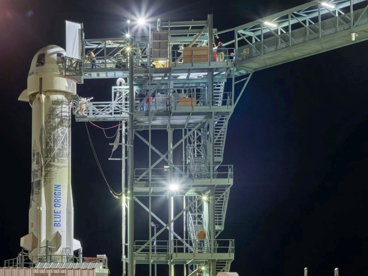 Image: Blue Origin's New Shepard rocket and capsule at a launchpad in Texas ahead of a Jan. 23, 2019 launch carrying experiments for NASA.