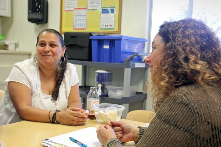Linda Aguilar, director of a Kidango child care center in San Jose, meets with Chally Grundwag as part of the center's early childhood mental health consultation program