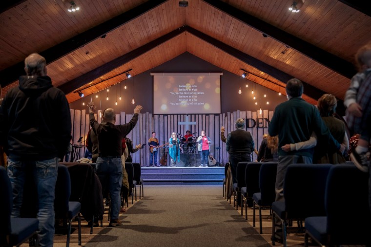 Congregants attend a church service at Ava Assembly of God. 