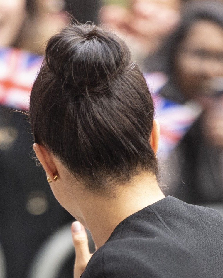 Meghan Markle wears a top knot hairstyle for the first time as a duchess