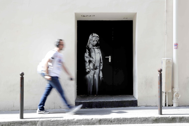 Image: FILES-FRANCE-STREET-ART-BANKSY