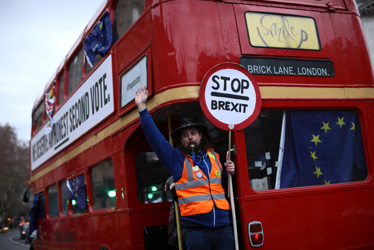Image: An E.U. supporter demonstrates on a bus in London