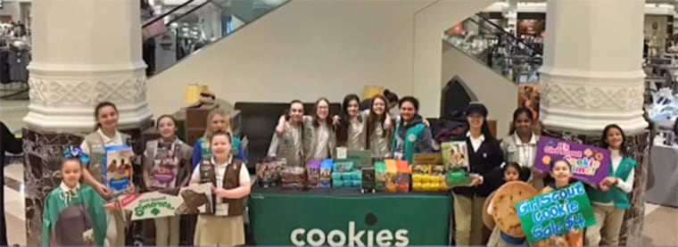 Girl Scouts sell cookies at a New Jersey mall